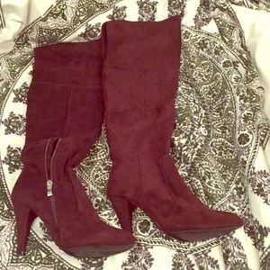 Lightly worn over the knee chocolate boots.